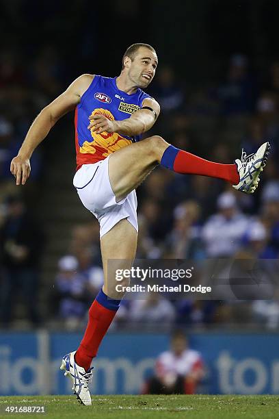 Trent West of the Lions kicks the ball during the round nine AFL match between the North Melbourne Kangaroos and the Brisbane Lions at Etihad Stadium...