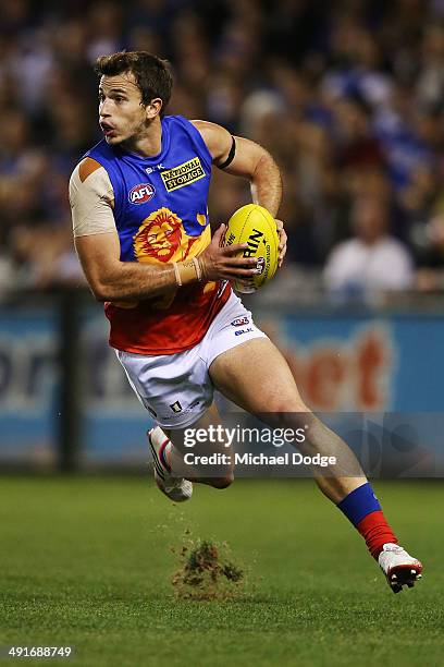 Jackson Paine of the Lions runs with the ball during the round nine AFL match between the North Melbourne Kangaroos and the Brisbane Lions at Etihad...