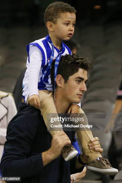 Kangaroos fans look ahead during the round nine AFL match between the North Melbourne Kangaroos and the Brisbane Lions at Etihad Stadium on May 17,...