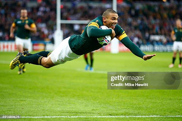 Bryan Habana of South Africa goes over to score their third try during the 2015 Rugby World Cup Pool B match between South Africa and USA at the...