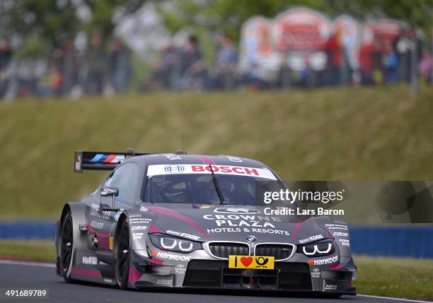 Joey Hand of USA and BMW Team RBM drives during a training session prior to the qualifying for the second round of the DTM 2014 German Touring Car...