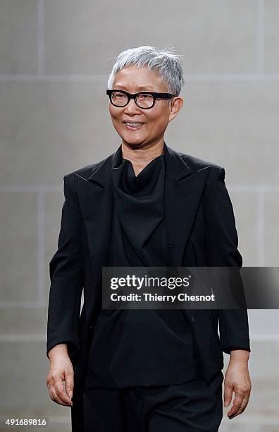 Korean designer Moon Young Hee acknowledges the public at the end of the Allude 2016 Spring/Summer ready-to-wear collection fashion show, on October...