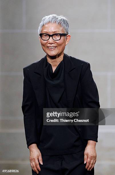 Korean designer Moon Young Hee acknowledges the public at the end of the Allude 2016 Spring/Summer ready-to-wear collection fashion show, on October...