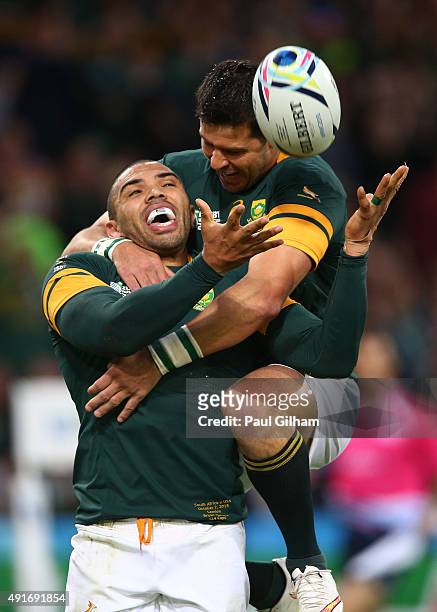Bryan Habana of South Africa celebrates scoring his second and South Africa's sixth try with Morne Steyn of South Africa during the 2015 Rugby World...