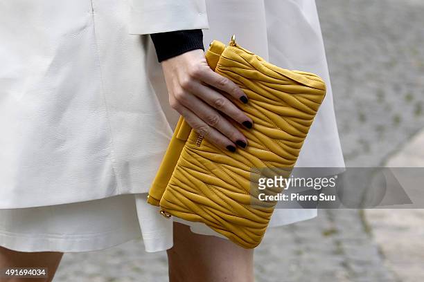 Louise Bourgoin, handbag detail, arrives at the Miu Miu show as part of the Paris Fashion Week Womenswear Spring/Summer 2016 on October 7, 2015 in...