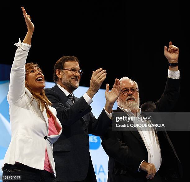 Spanish Prime Minister Mariano Rajoy , Popular Party's leader of the Catalonia region Alicia Sanchez Camacho and Popular Party's candidate for the...