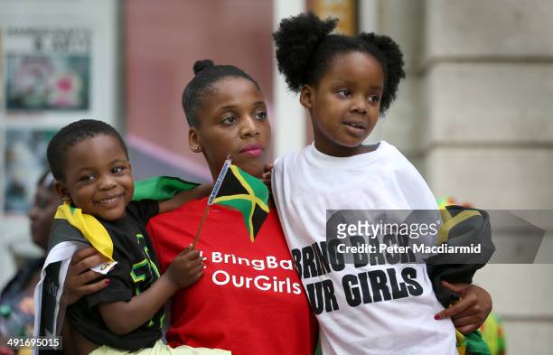 Supporters calling for the release of schoolgirls abducted by Boko Haram Islamists protest outside the Nigerian embassy on May 17, 2014 in London,...