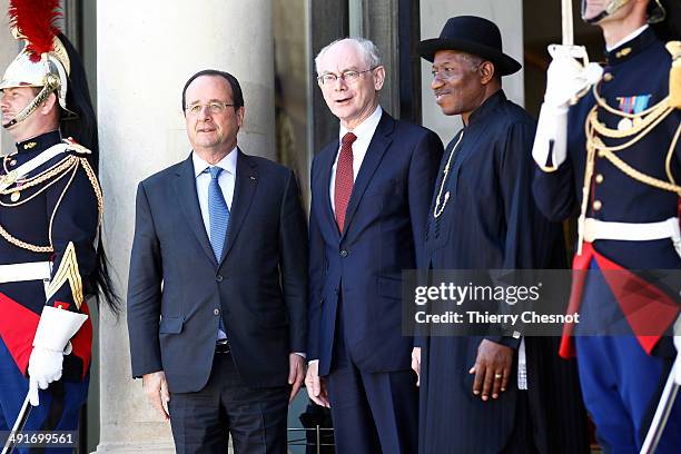 European Council President Herman Van Rumpuy , French President Francois Hollande and Nigeria's President Goodluck Jonathan pose for a picture before...