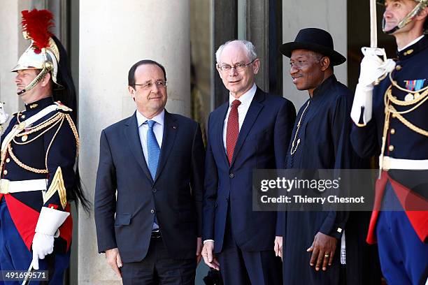 European Council President Herman Van Rumpuy , French President Francois Hollande and Nigeria's President Goodluck Jonathan pose for a picture before...