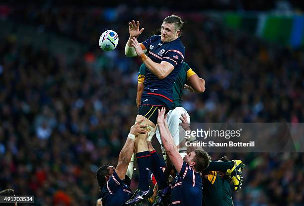Louis Stanfill of the United States collects the line out ball during the 2015 Rugby World Cup Pool B match between South Africa and USA at the...