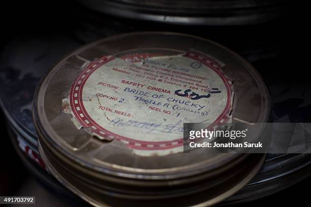 An English language film reel is stored near the projection room at Ariana Cinema June 4, 2011 in Kabul, Afghanistan. Going to the movies, once...