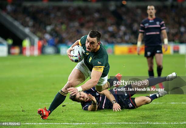 Jesse Kriel of South Africa goes over for his try during the 2015 Rugby World Cup Pool B match between South Africa and USA at Olympic Stadium on...