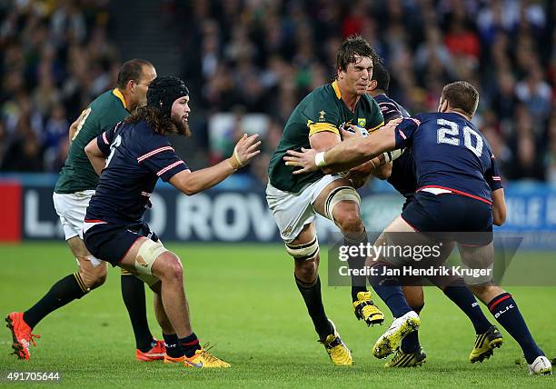 Eben Etzebeth of South Africa crashes into Cam Dolan of the United States during the 2015 Rugby World Cup Pool B match between South Africa and USA...