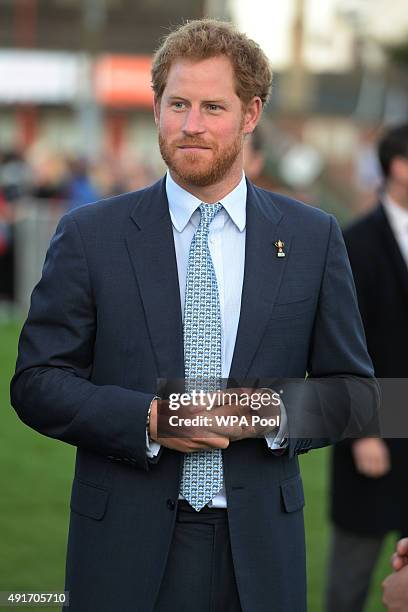 Prince Harry visits Paignton Rugby Club in Devon to present them with an RFU, Gold Standard facilities award on October 7, 2015 in Paignton in Devon,...