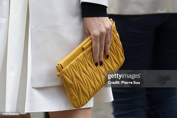 Louise Bourgoin, handbag detail, arrives at the Miu Miu show as part of the Paris Fashion Week Womenswear Spring/Summer 2016 on October 7, 2015 in...