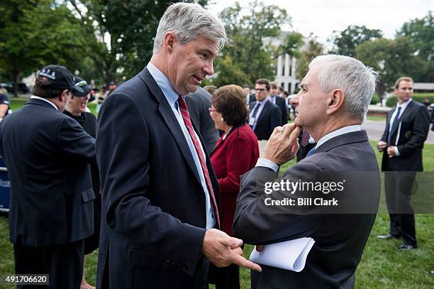 Sen. Sheldon Whitehouse left, and Sen. Jack Reed talk before participating in the NDD United "Rally for a Stronger America" outside of the Capitol on...