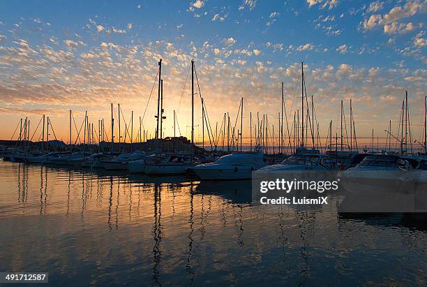 sunset on the port - denia foto e immagini stock