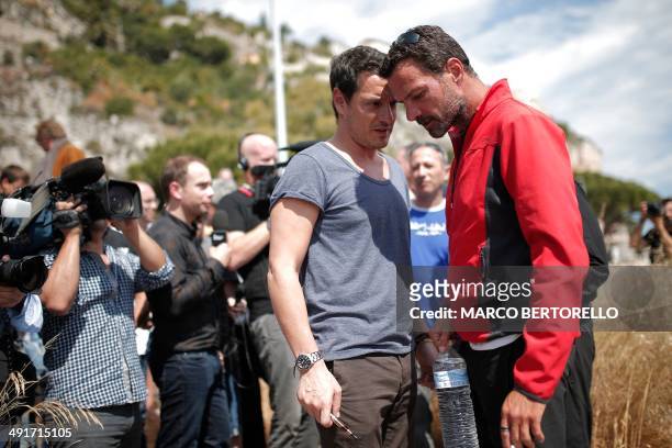 Former trader Jerome Kerviel speaks with his lawyer David Koubbi as he arrives near the French border on May 17, 2014 outside Vintimille . Jerome...