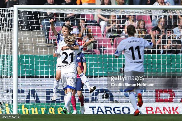 Kozue Ando of Frankfurt celebrates her team's first goal with her team mate Ana-Maria Crnogorecevic of Frankfurt during the Women's DFB Cup Final...