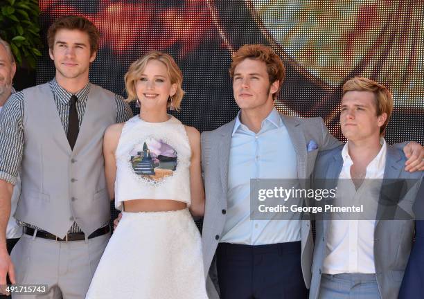 Actors Liam Hemsworth, Jennifer Lawrence, Sam Claflin, Josh Hutcherson attend 'The Hunger Games: Mockingjay Part 1' photocall at the 67th Annual...