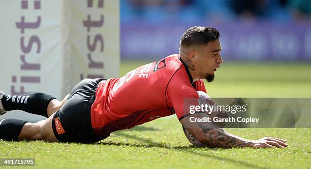 Rangi Chase of Salford Red Devils scores his first half try during the Super League match between Widnes Vikings and Salford Red Devils at Etihad...
