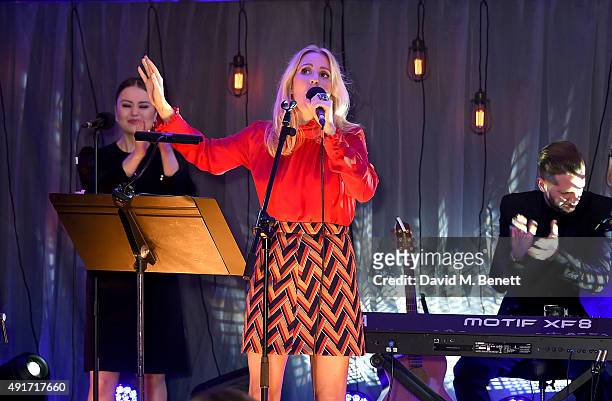 Ellie Goulding performs at the Special K Bring Colour Back launch at The Hospital Club on October 7, 2015 in London, England.