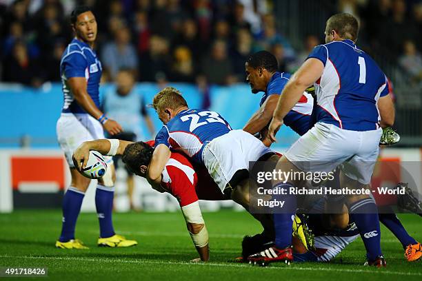 Mamuka Gorgodze of Georgia goes over to score the first try during the 2015 Rugby World Cup Pool C match between Namibia and Georgia at Sandy Park on...