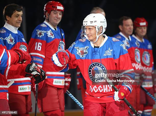 Russian President Vladimir Putin attends an ice hockey match of the Night Hockey League on October 7, 2015 in Sochi, Russia. Russian President...