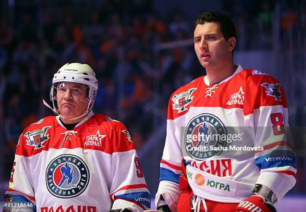 Russian billionaire and businessman Arkady Rotenberg and his nephew, businessman Roman Rotenberg attend an ice hockey match of the Night Hockey...