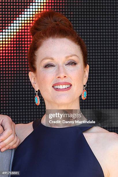 Julianne Moore attends the "The Hunger Games: Mockingjay Part 1" Photocall at the 67th Annual Cannes Film Festival on May 17, 2014 in Cannes, France.