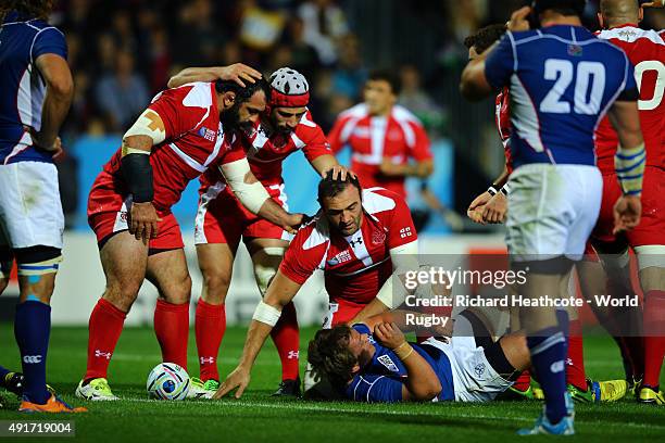 Mamuka Gorgodze of Georgia goes over to score the first try during the 2015 Rugby World Cup Pool C match between Namibia and Georgia at Sandy Park on...