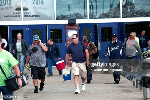 Fiat Chrysler Automobile workers exit from the Warren Truck Assembly Plant at the end of their shift October 7, 2015 in Warren, Michigan. The United...