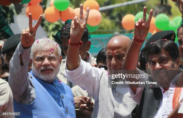 Prime ministerial candidate Narendra Modi along with BJP president Rajnath Singh and other party senior leaders arrive to attend BJP parliament board...