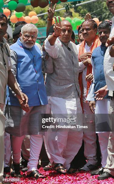 Prime ministerial candidate Narendra Modi along with BJP president Rajnath Singh and other party senior leaders arrive to attend BJP parliament board...