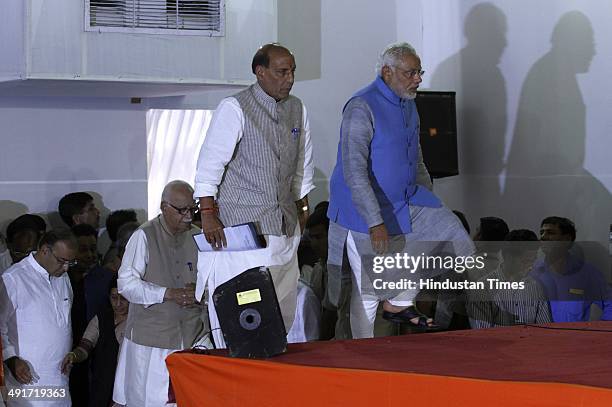 Prime ministerial candidate Narendra Modi along with BJP president Rajnath Singh and party senior leader LK Advani during the BJP parliament board...