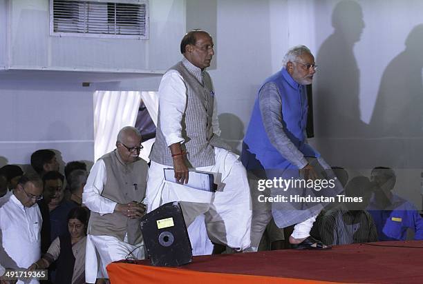 Prime ministerial candidate Narendra Modi along with BJP president Rajnath Singh and party senior leader LK Advani during the BJP parliament board...