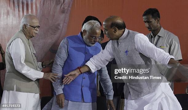 Prime ministerial candidate Narendra Modi along with BJP president Rajnath Singh and party senior leader LK Advani during the BJP parliament board...