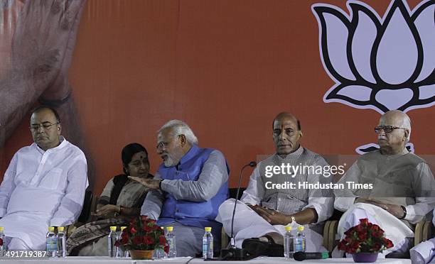 Prime ministerial candidate Narendra Modi along with BJP president Rajnath Singh and party senior leaders Arun Jaitely, Sushma Swaraj and LK Advani...