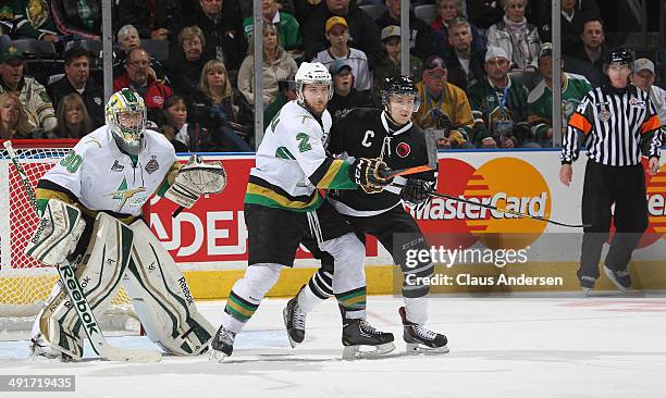 Randy Gazzola of the Val'Dor Foreurs battles against Chris Tierney of the London Knights in Game One of the 2014 Mastercard Memorial Cup at Budweiser...