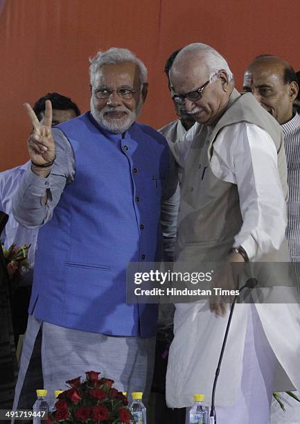 Prime ministerial candidate Narendra Modi along with BJP president Rajnath Singh and party senior leader LK Advani during the BJP parliament board...