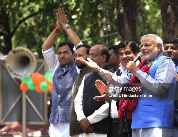 Prime ministerial candidate Narendra Modi along with party senior leaders arrive to attend BJP parliament board meeting, after his party's landslide...