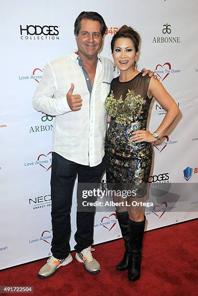 Director Jimmy Van Patten and host/newscaster Leyna Nguyen at the Celebrity Poker Tournament To Benefit Love Across The Ocean held at Commerce Casino...