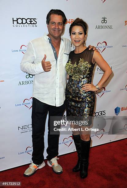 Director Jimmy Van Patten and host/newscaster Leyna Nguyen at the Celebrity Poker Tournament To Benefit Love Across The Ocean held at Commerce Casino...