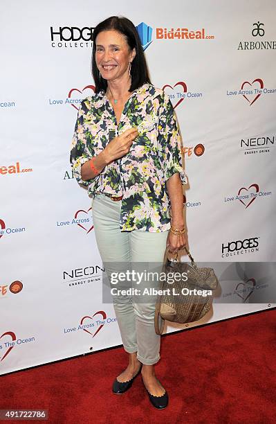 Actress Mimi Rogers and host/newscaster Leyna Nguyen at the Celebrity Poker Tournament To Benefit Love Across The Ocean held at Commerce Casino on...