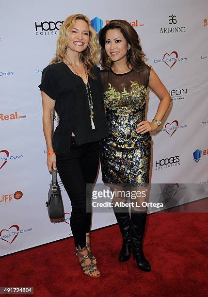 Actress Victoria Pratt and host/newscaster Leyna Nguyen at the Celebrity Poker Tournament To Benefit Love Across The Ocean held at Commerce Casino on...