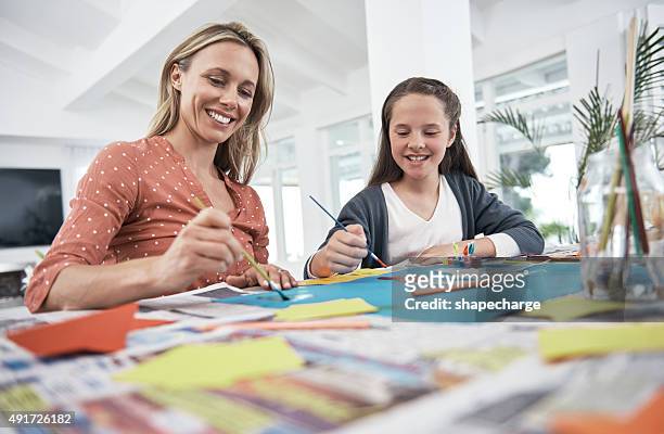 mother and daughter creativity - small placard stock pictures, royalty-free photos & images