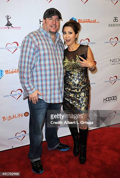 Comic Jimmy Della Valle and host/newscaster Leyna Nguyen at the Celebrity Poker Tournament To Benefit Love Across The Ocean held at Commerce Casino...