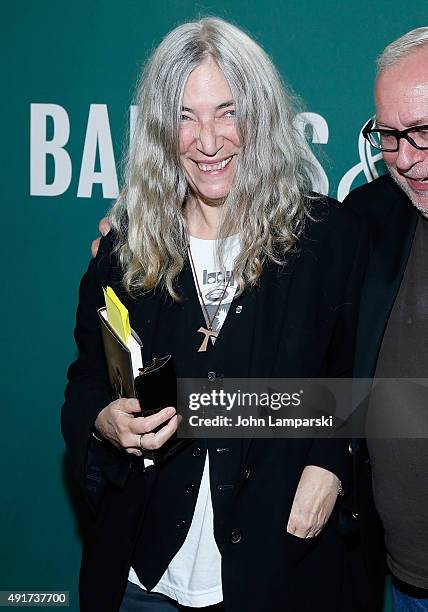 Patti Smith signs copies of "M Train" at Barnes & Noble Union Square on October 7, 2015 in New York City.