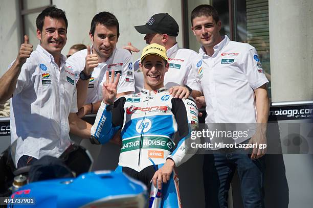 Luis Salom of Spain and Pons HP40 celebrates with team at the end of the qualifying practice during the MotoGp of France - Qualifying on May 17, 2014...