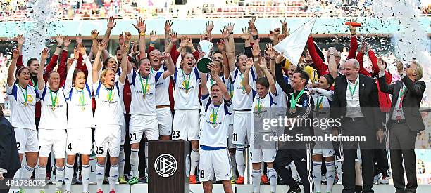 Team mates of Frankfurt celebrate winning with the trophy after the Women's DFB Cup Final between SGS Essen and 1. FFC Frankfurt at...